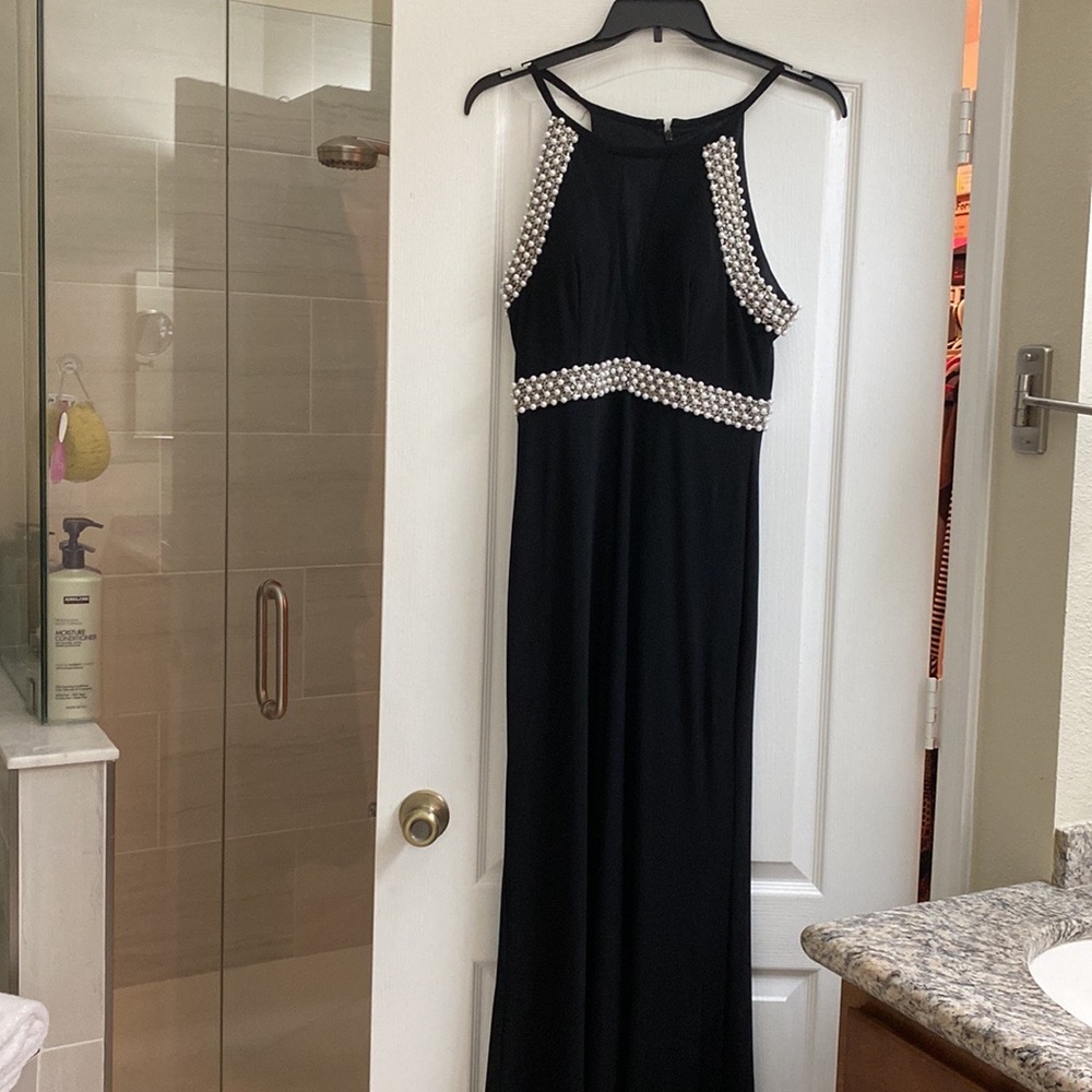 Formal wear size 8-10.  Colors of the two dresses are black and royal blue.
